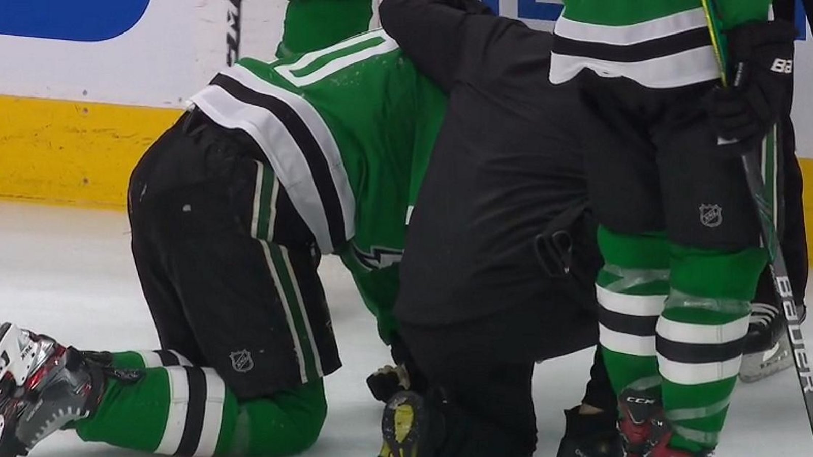 Nathan MacKinnon takes out Corey Perry with a high hit.