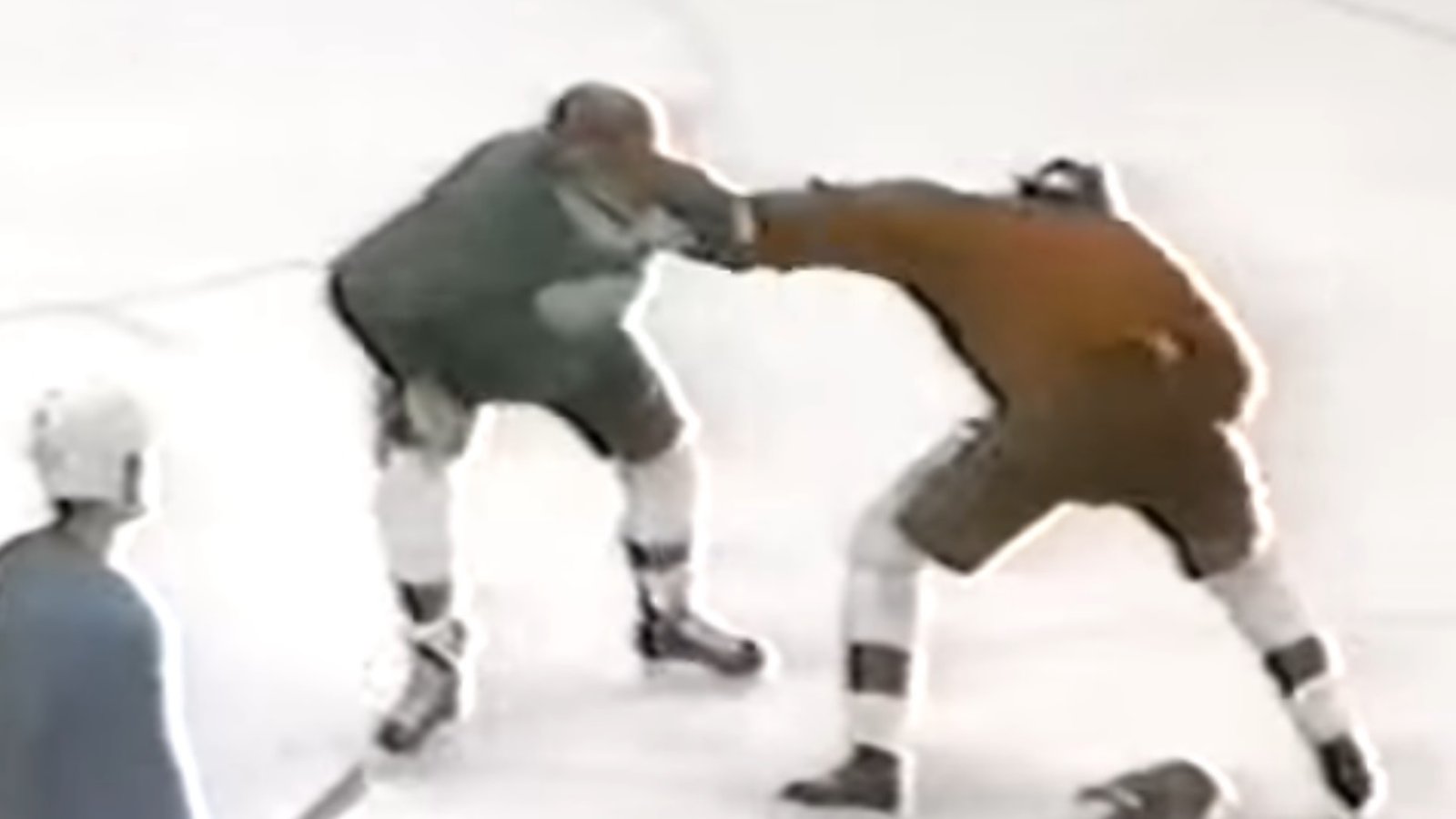 Throwback: Teammates Keith Primeau and Bob Probert throw down.