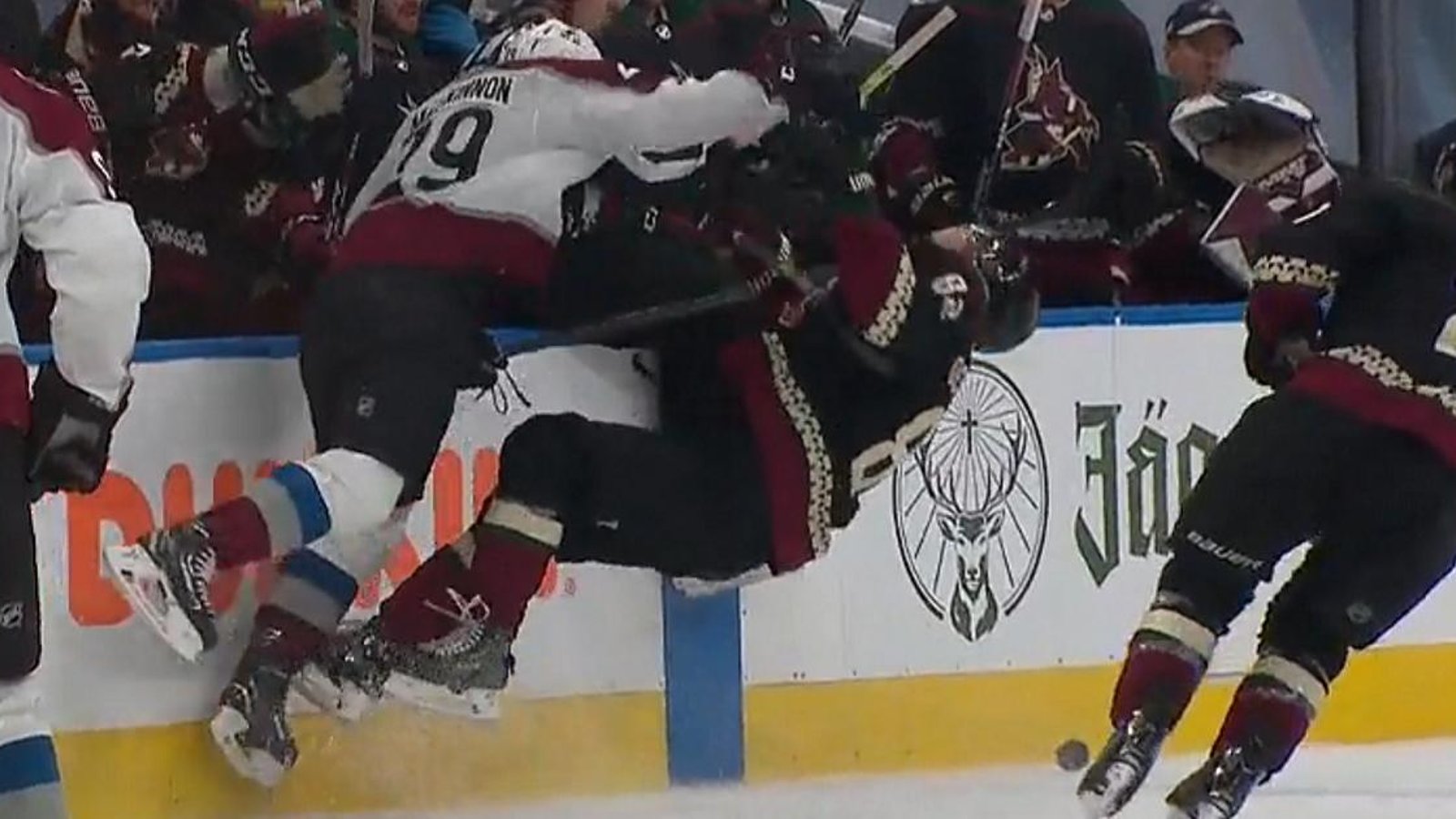 Nathan MacKinnon flattens Jordan Oesterle with a reverse hit.