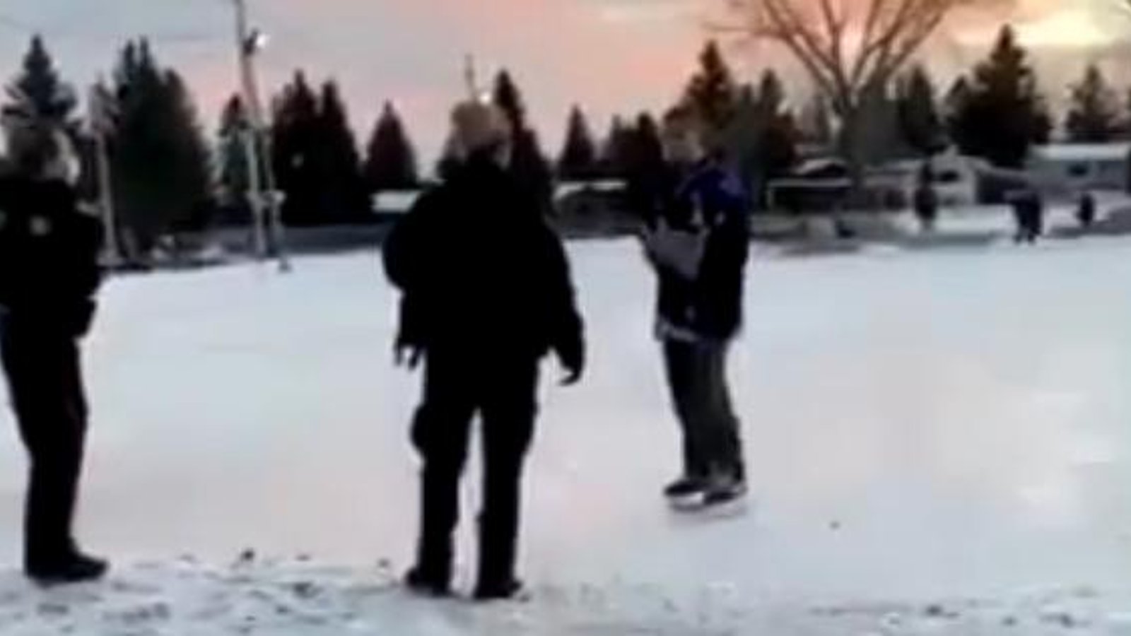 Man violently arrested by Canadian police while playing outdoor hockey.