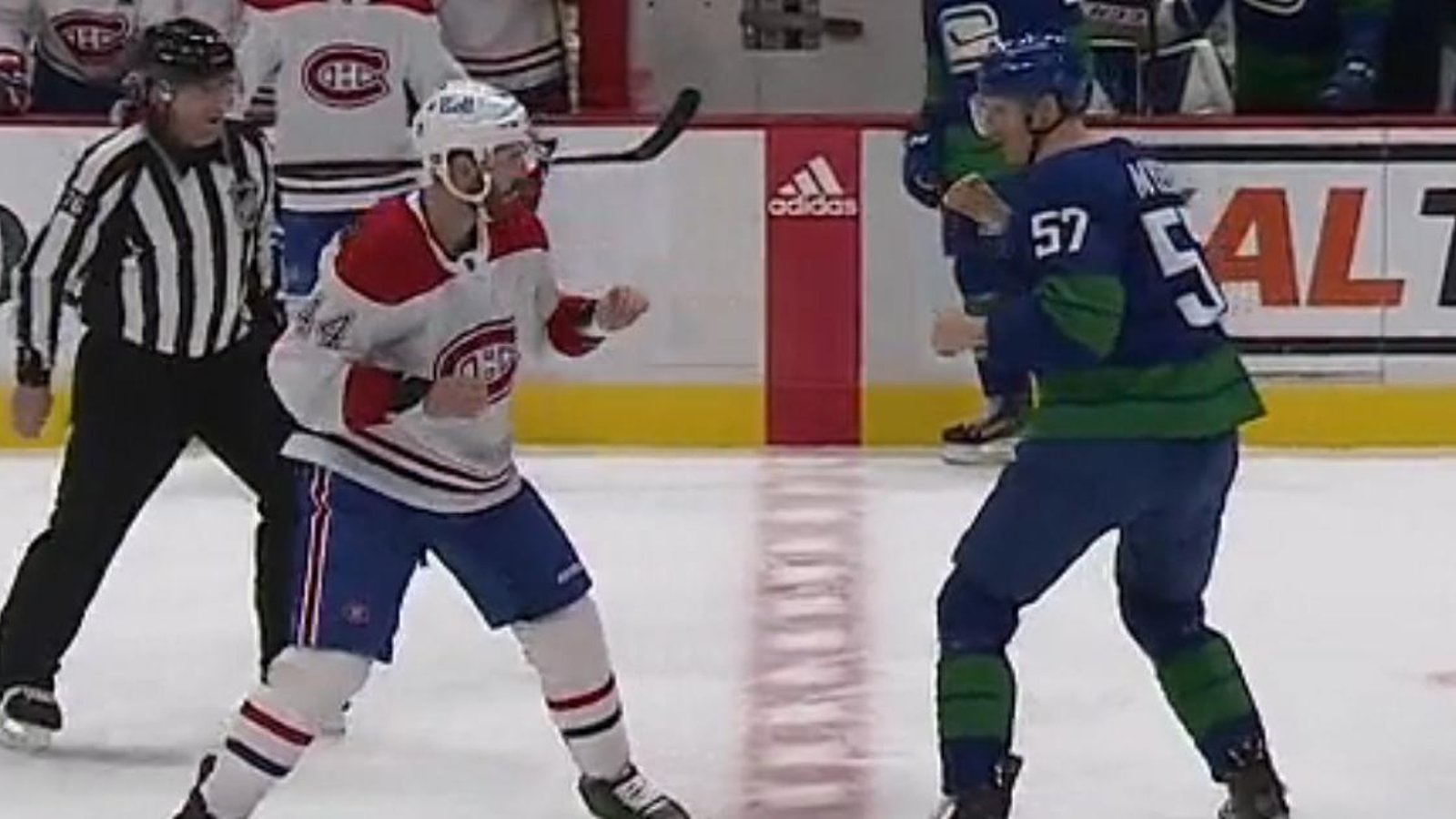Joel Edmundson and Tyler Myers go toe to toe in the first.