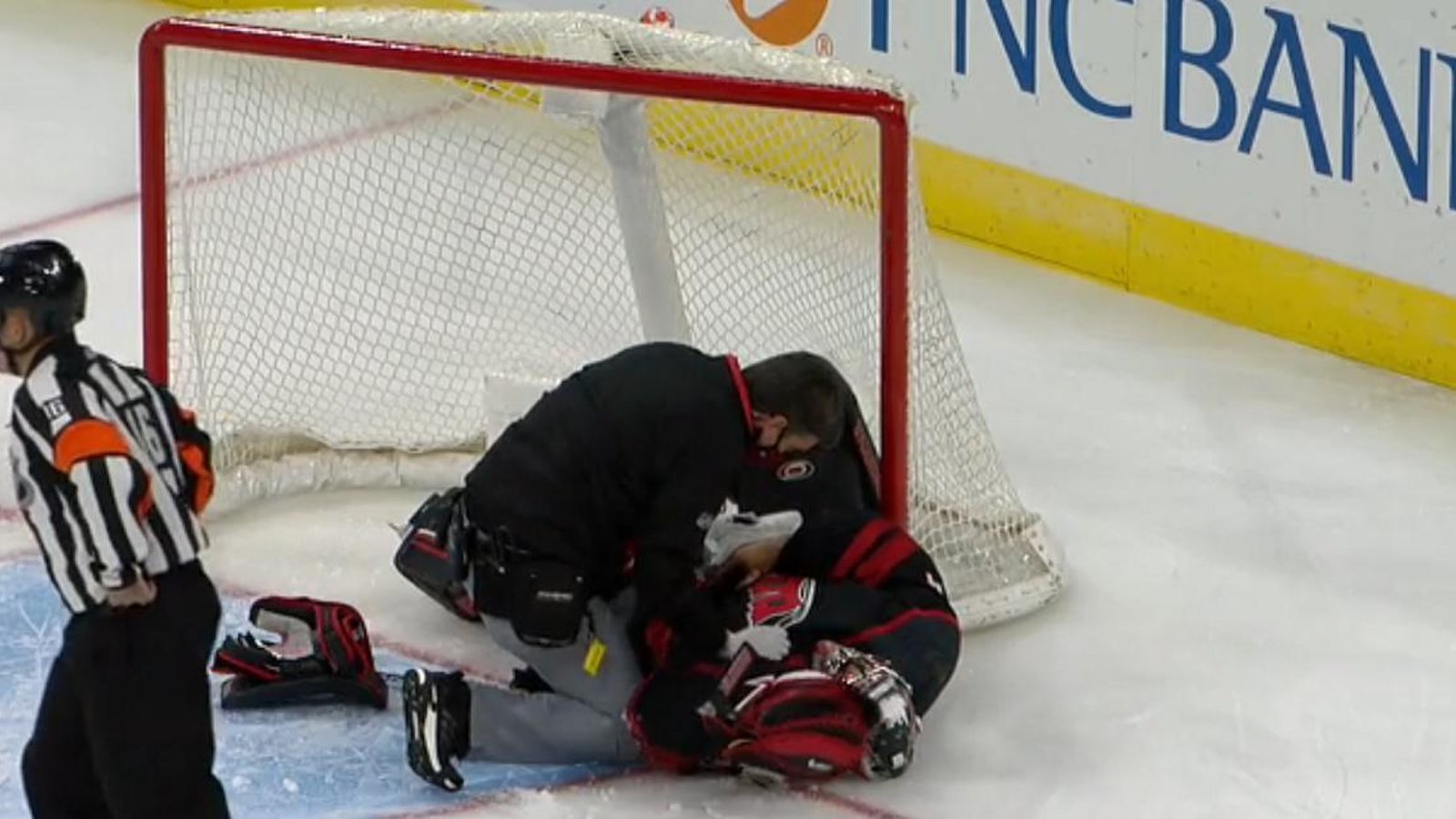 Petr Mrazek leaves the game after being pancaked in his own net.