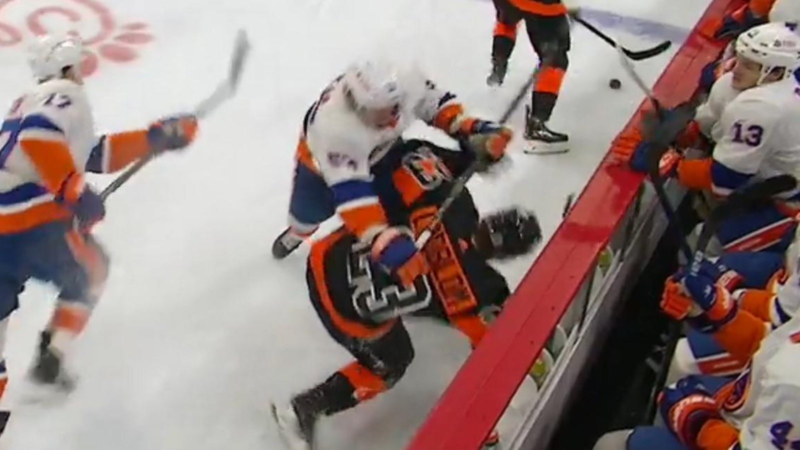 Casey Cizikas cross-checks Oskar Lindblom in the head.
