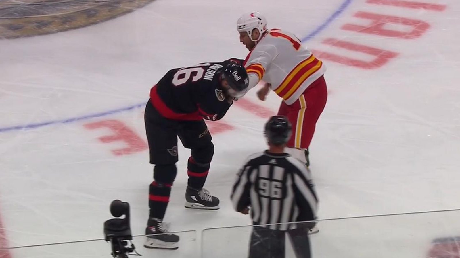 Milan Lucic manhandles Austin Watson.