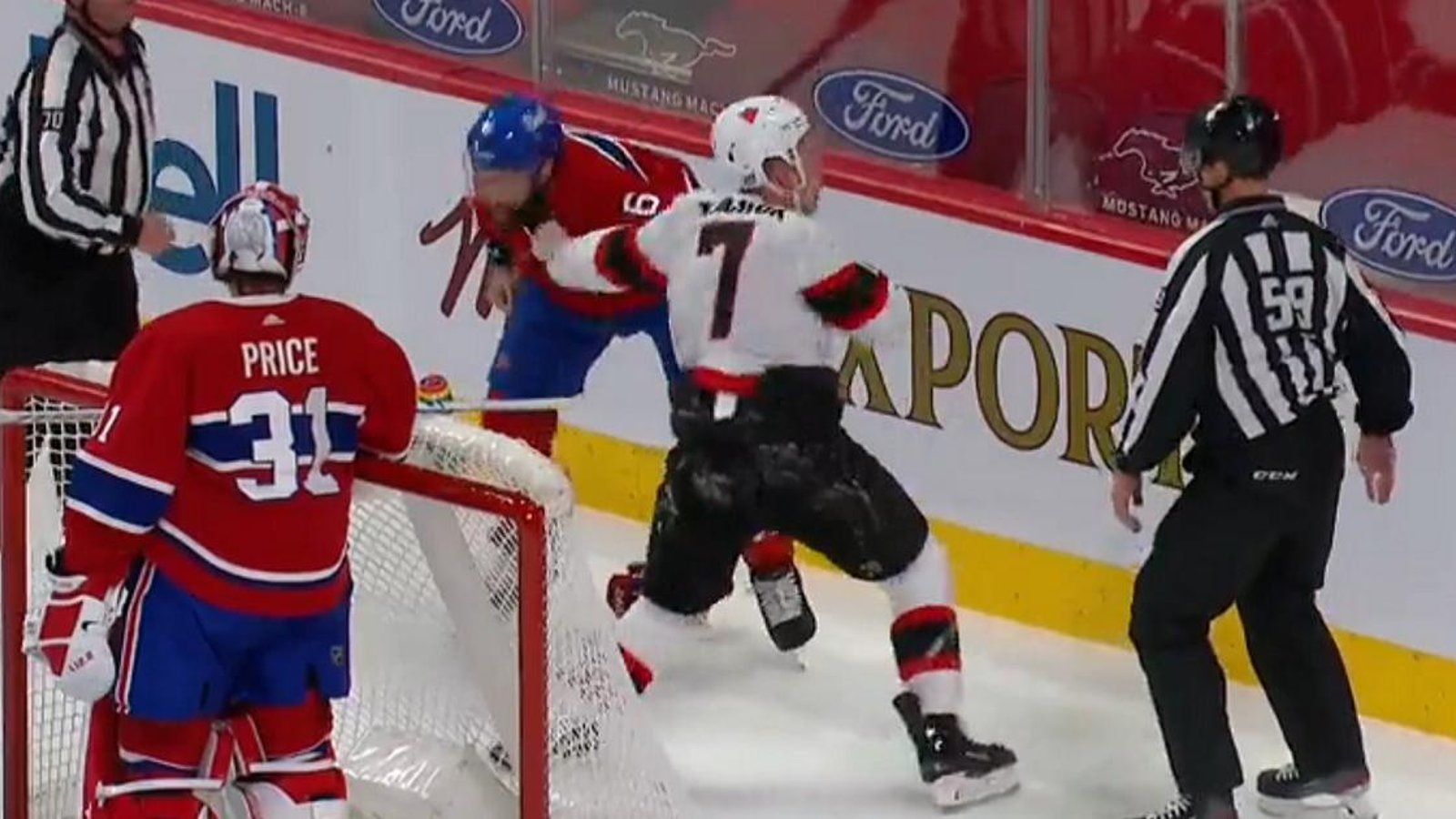 Brady Tkachuk and Shea Weber drop the gloves at the end of the first!