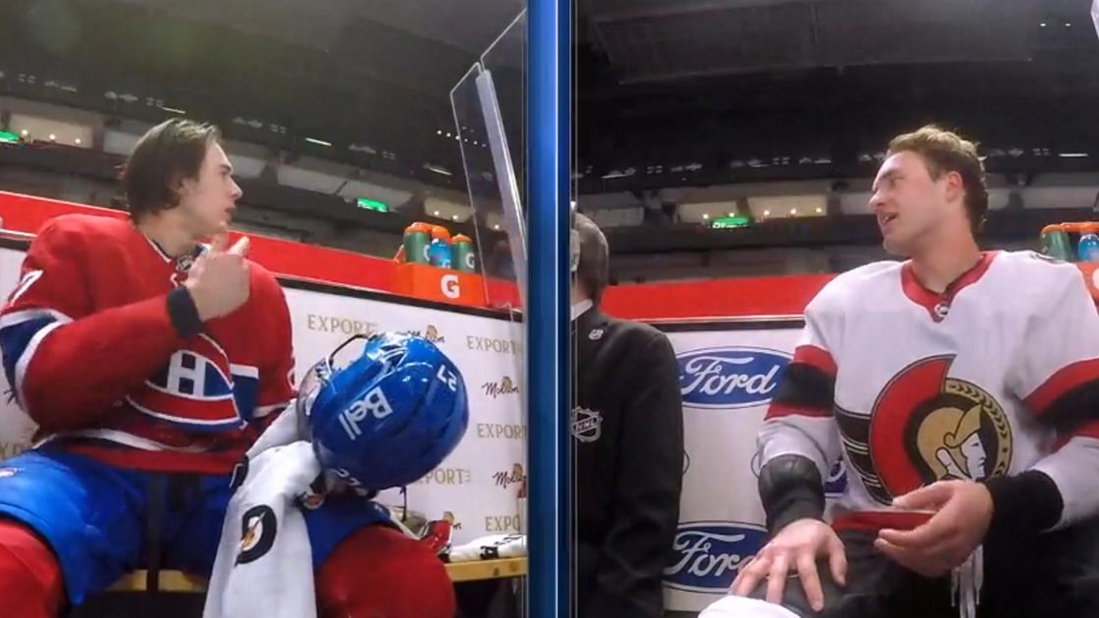 Josh Norris taunts Alexander Romanov in the penalty box.
