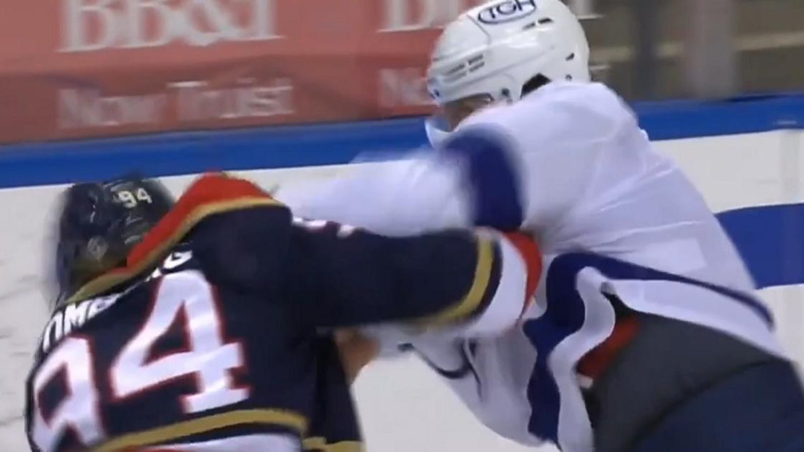 Luke Schenn pummels Ryan Lomberg seconds after he steps out on the ice.