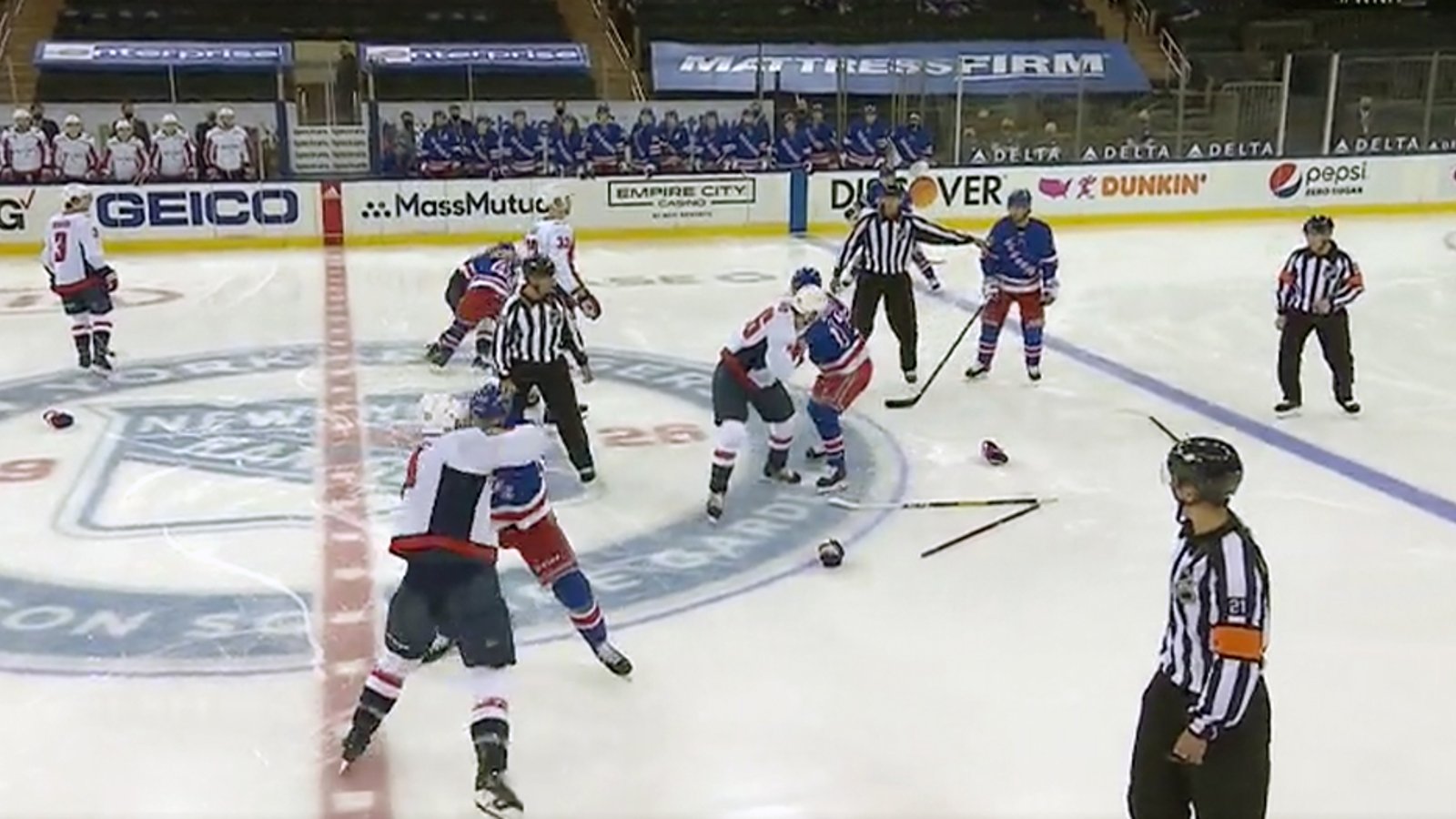 Rangers and Capitals begin the game with an old fashioned line brawl