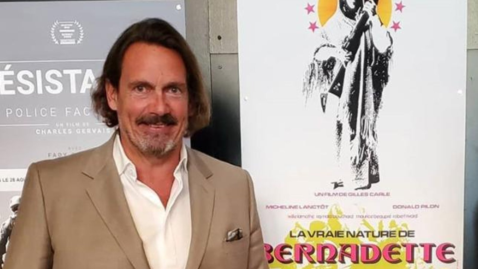 Pierre Karl Péladeau publie une adorable photo de sa fille aînée qui tient bébé Henri dans ses bras