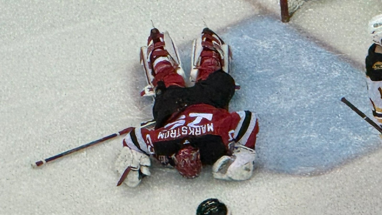 Goalie Jacob Markstrom gets badly run over and is down in serious pain!