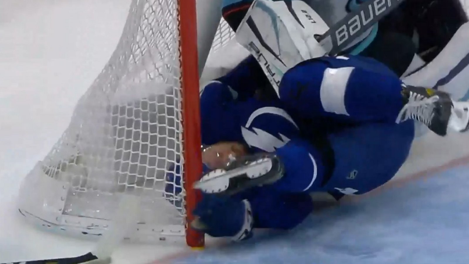 Katchouk takes a huge hit and goes head first into the post.