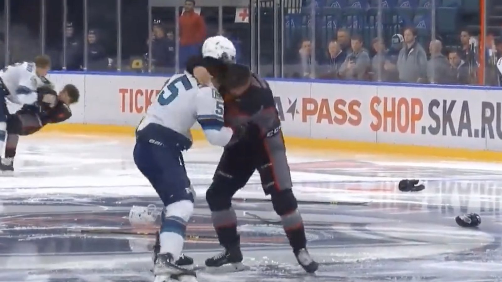 KHL game kicks off with intense line brawl after opening face-off