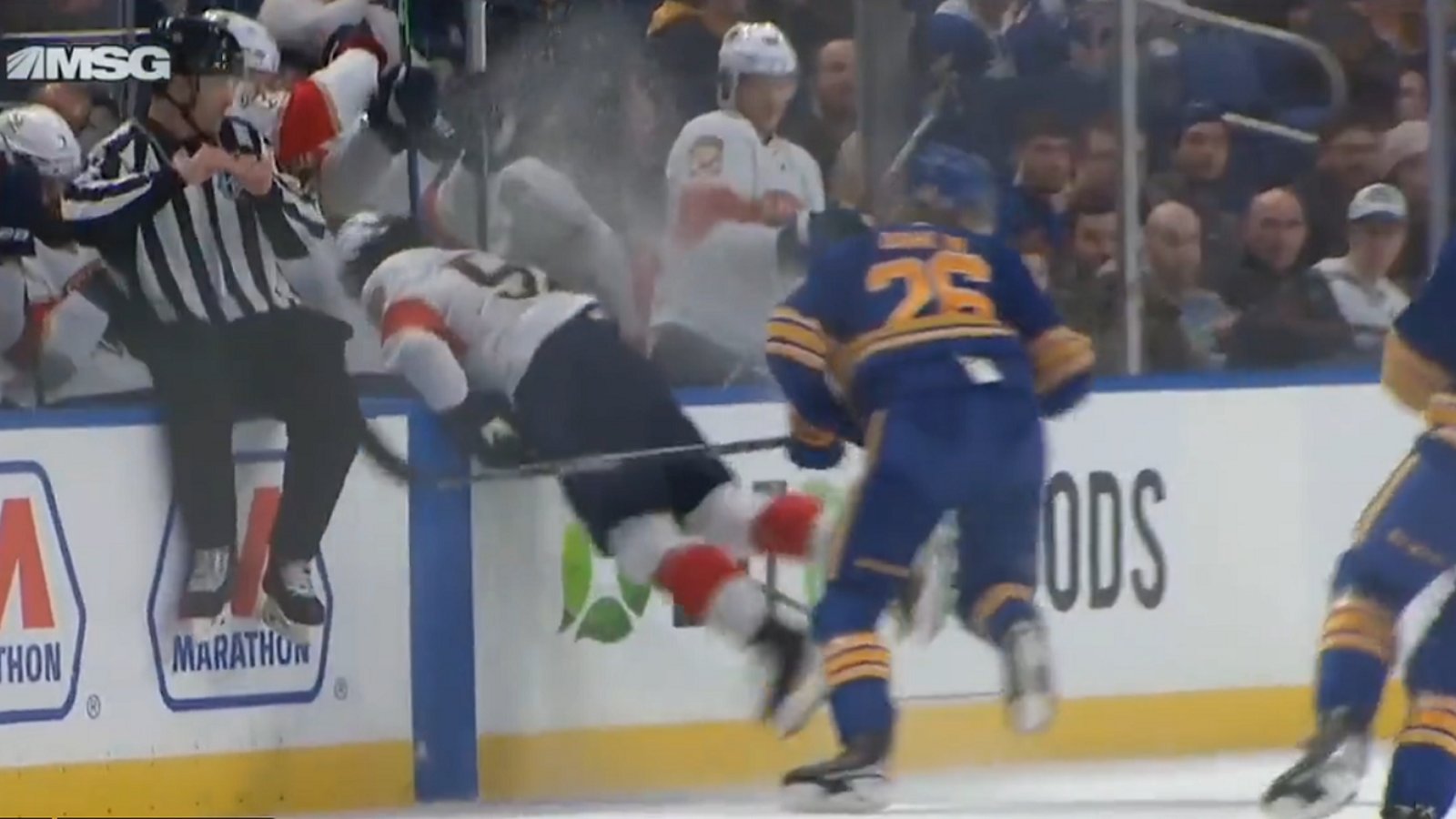 Rasmus Dahlin makes MacKenzie Weegar eat the boards.
