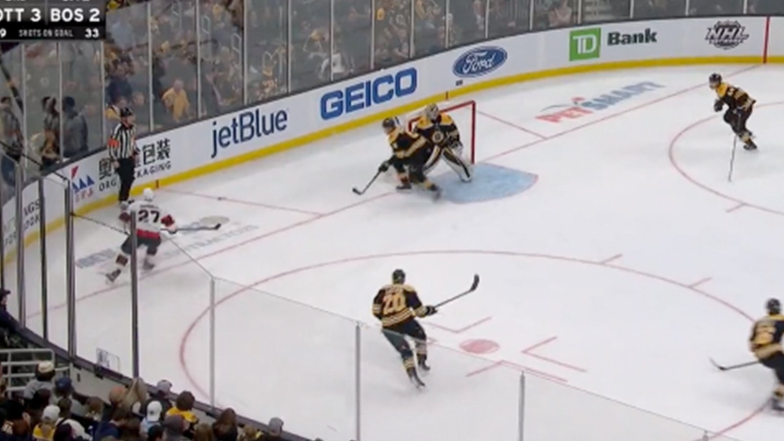 Referee literally kicks a perfect pass to Bruins defender... on purpose