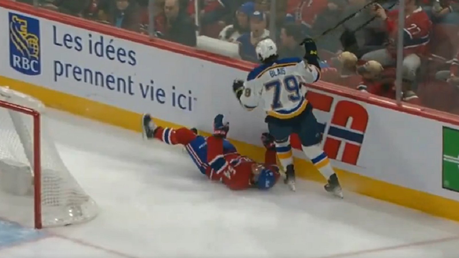 Harris hurt bad after Blais nearly takes his head off.