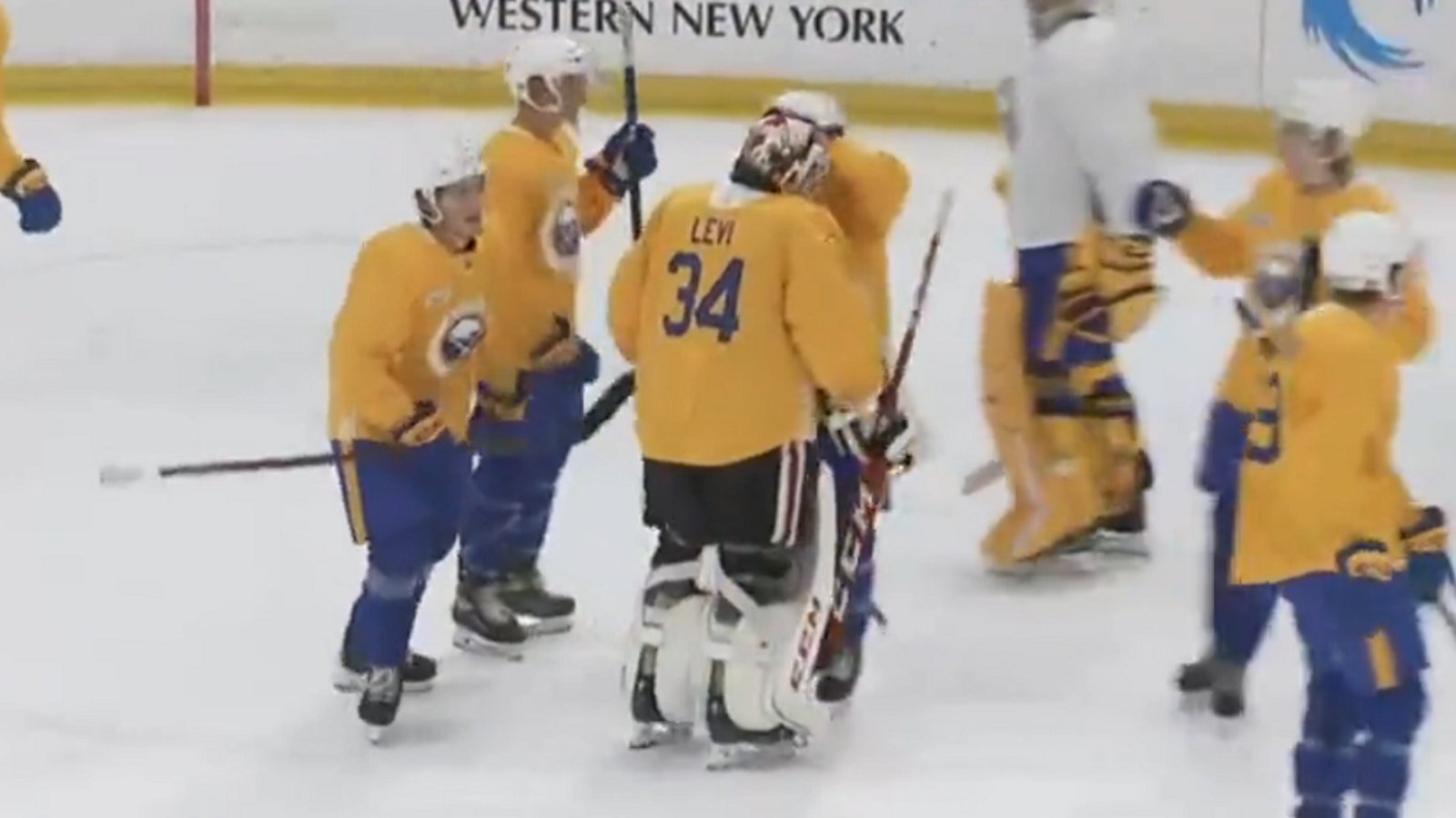 Devon Levi mobbed by teammates after insane save in development camp.