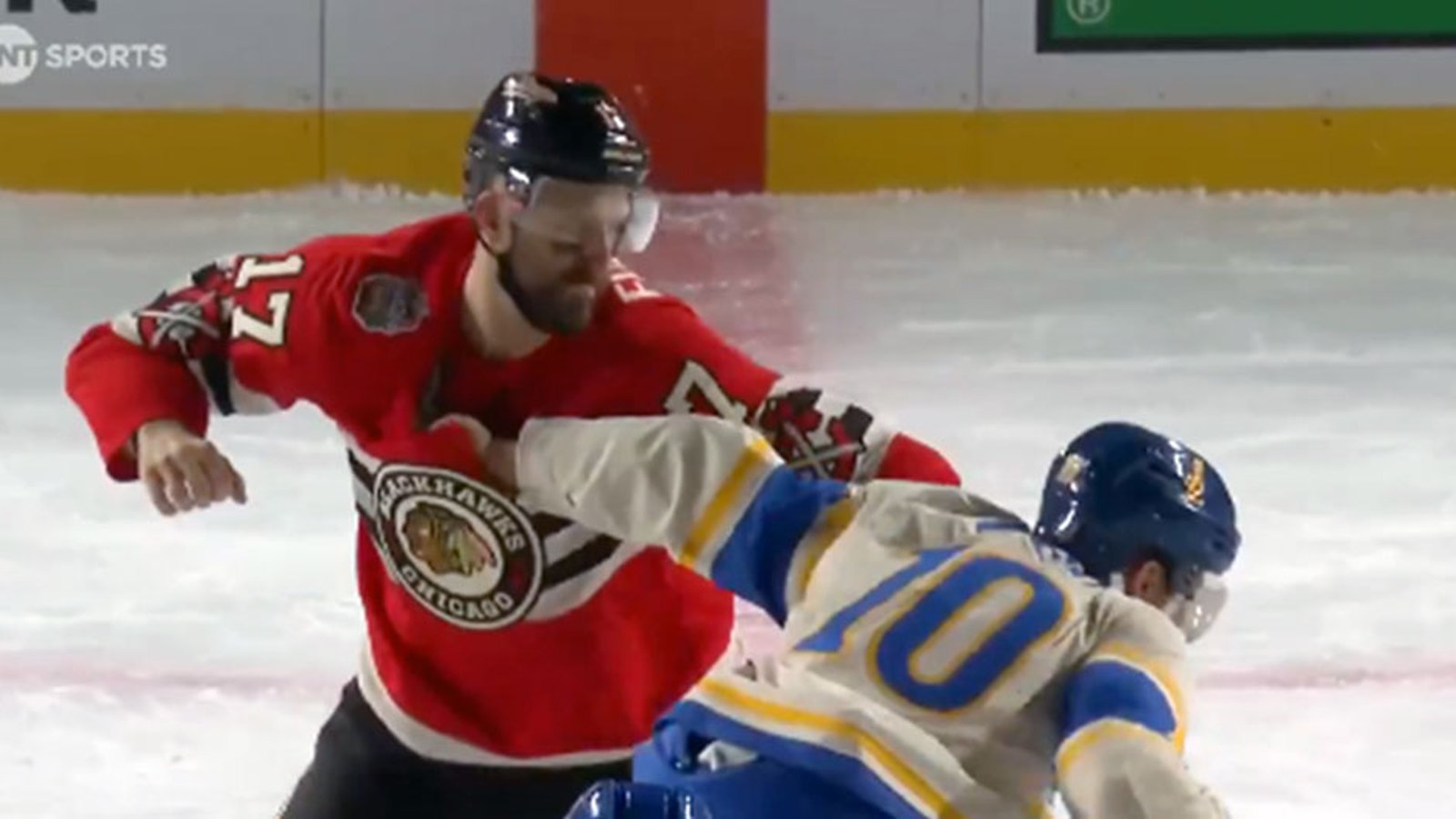 Captains Foligno and Schenn throw down at center ice during the Winter Classic