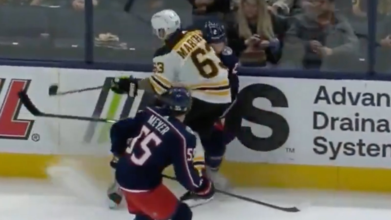 Brad Marchand injures Andrew Peeke with huge hit to the head!