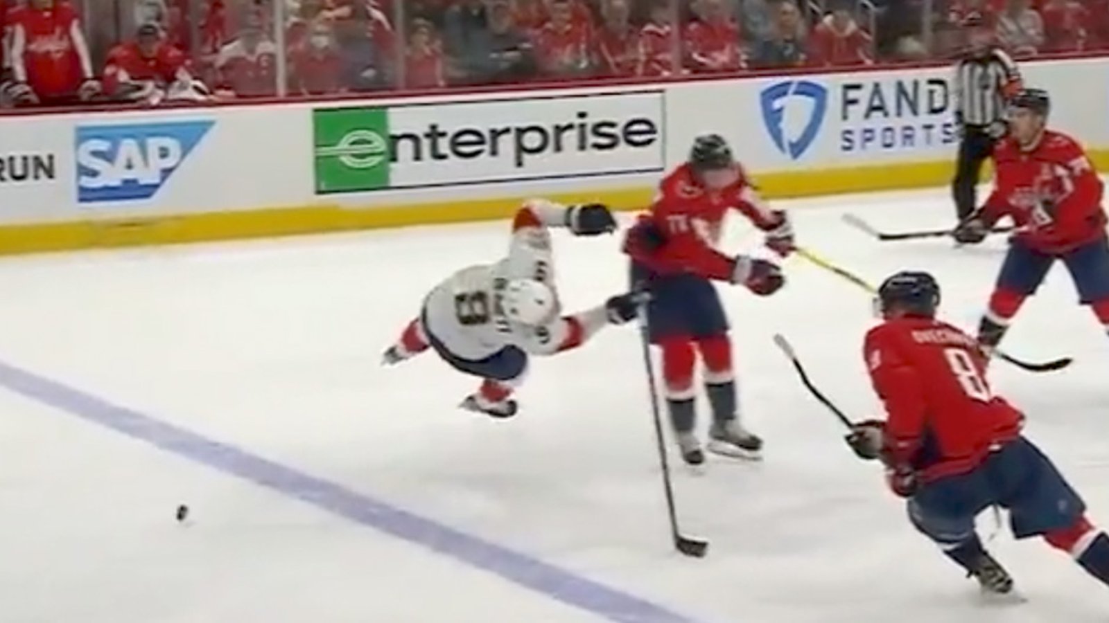 LOOK: Borderline hit by T.J. Oshie leads directly to Caps go-ahead goal! 