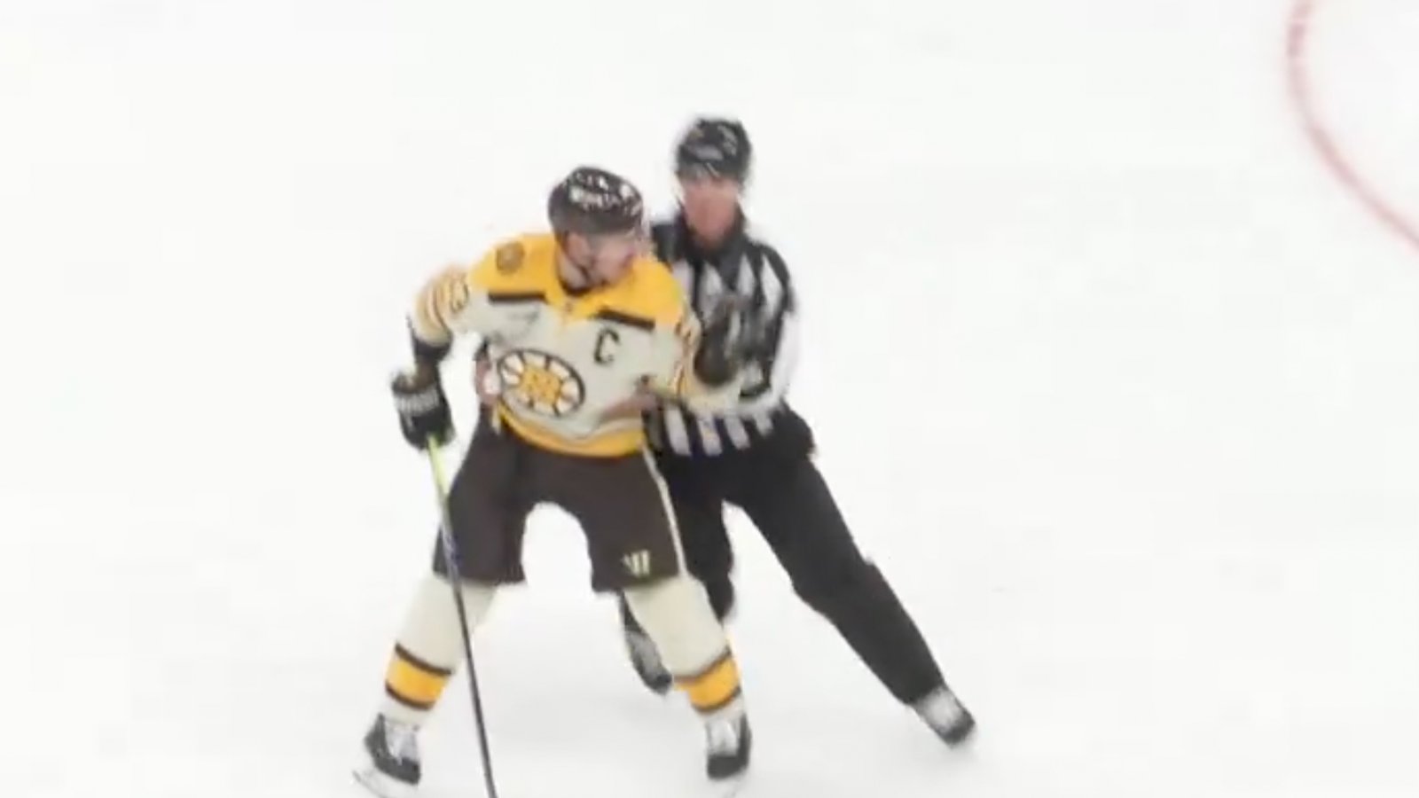 Brad Marchand caught making threats in hot-mic incident!