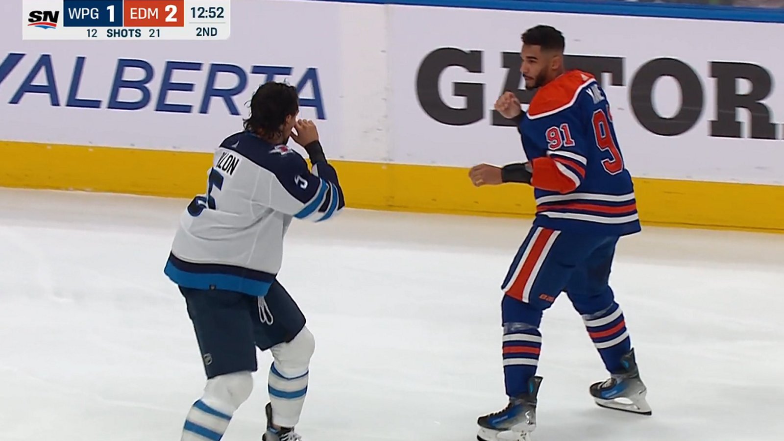 Evander Kane and Brenden Dillon drop the gloves on Saturday night.