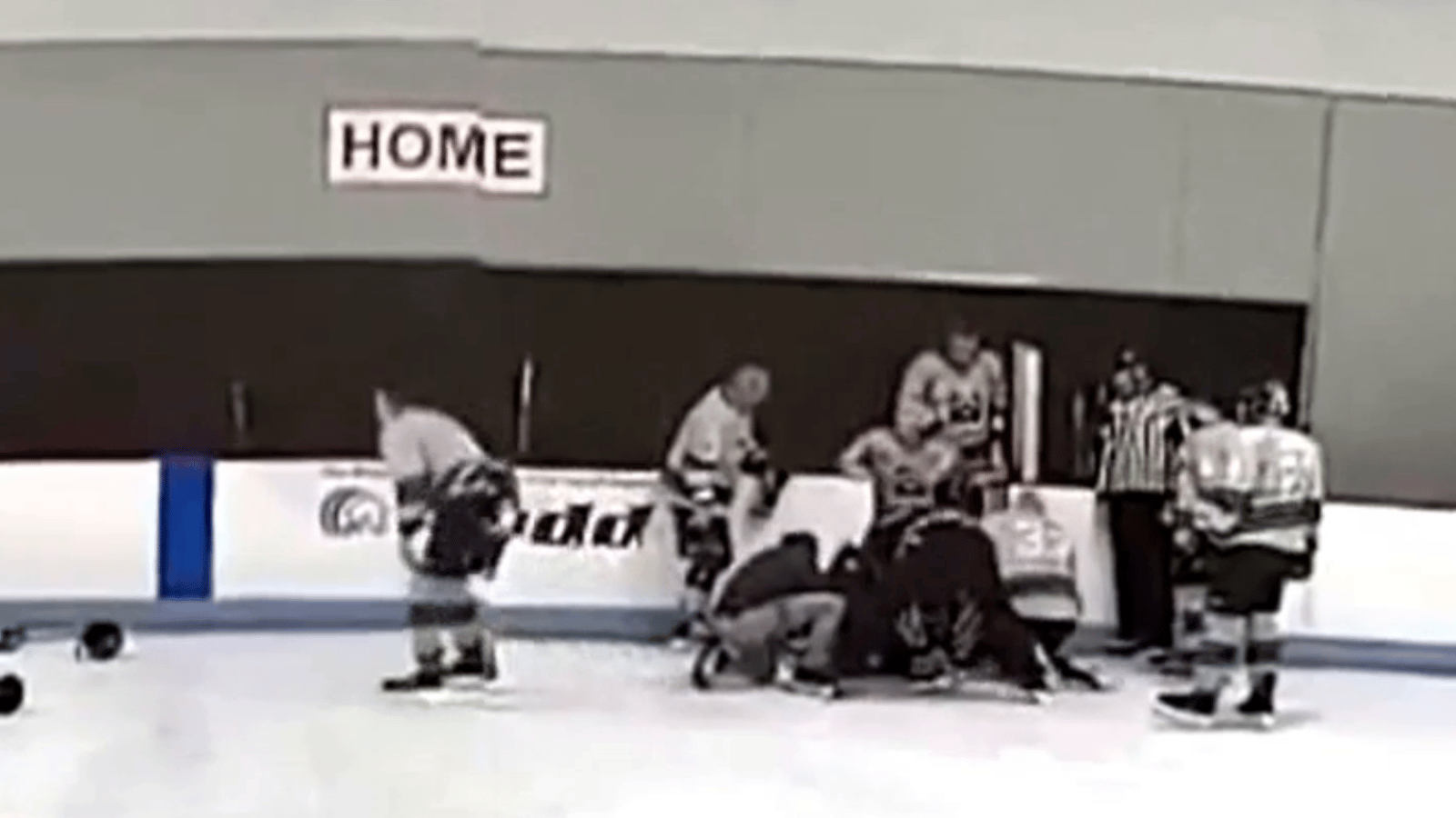 61 year old hockey player saved by teammates after heart attack on ice 