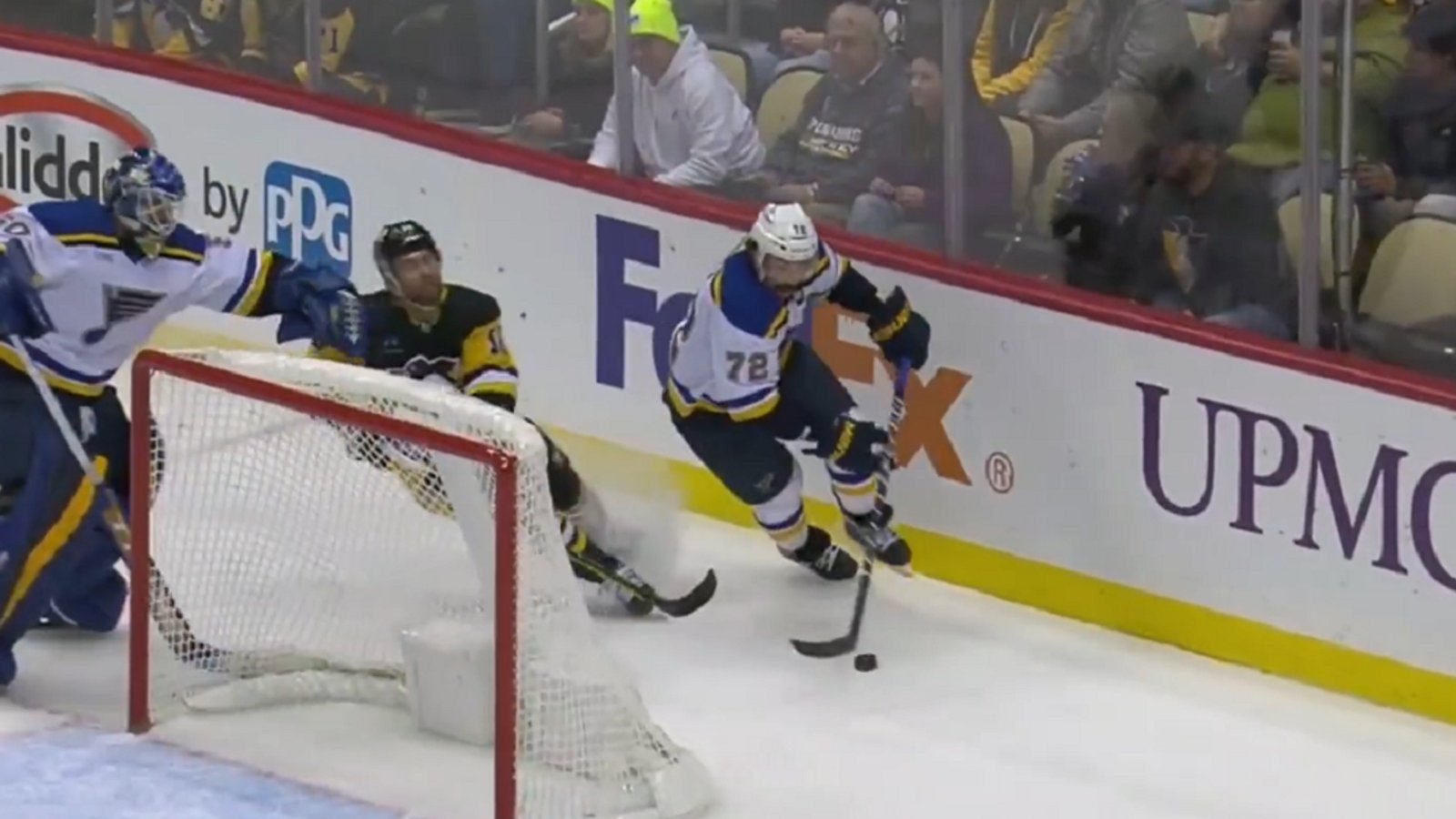Jordan Binnington hits Jason Zucker in the face.