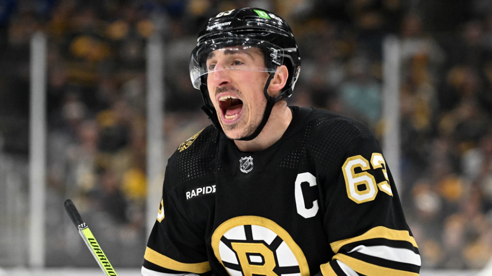 NHL players past and present react to shocking Brad Marchand trade.