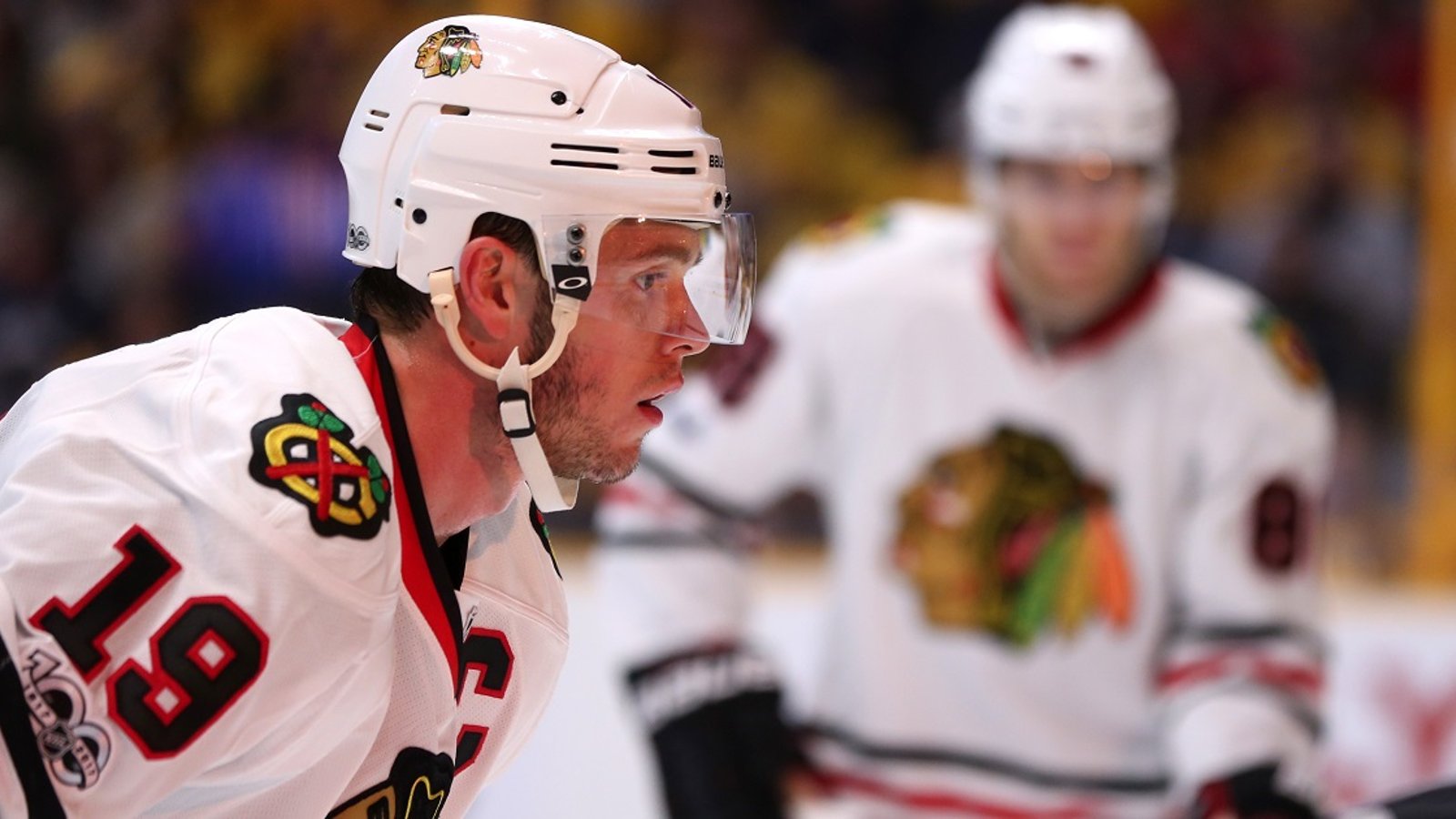 Maxim Lapierre buries Blackhawks captain Jonathan Toews.