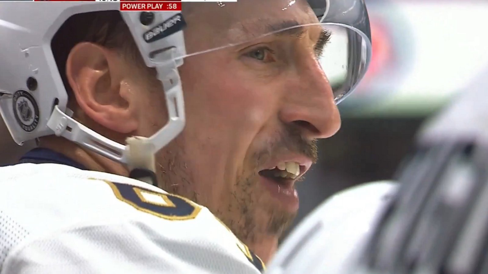 Cameras catch Brad Marchand trash talking the Senators.