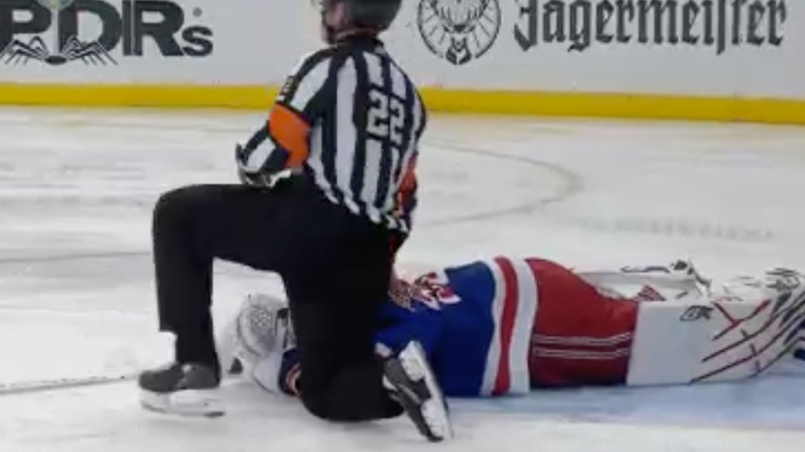 Goalie Igor Shesterkin goes down in obvious pain and it does not look good 