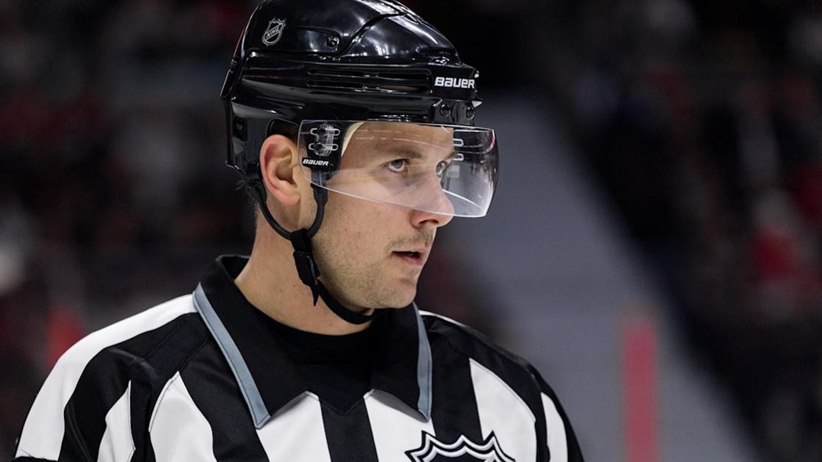 Hot mic catches NHL official dropping an F-bomb.