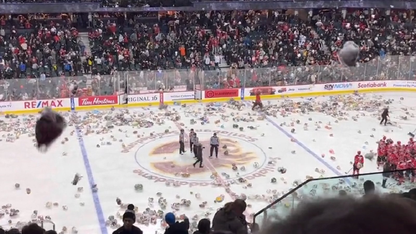Fans in Calgary flood the ice with teddy bears!