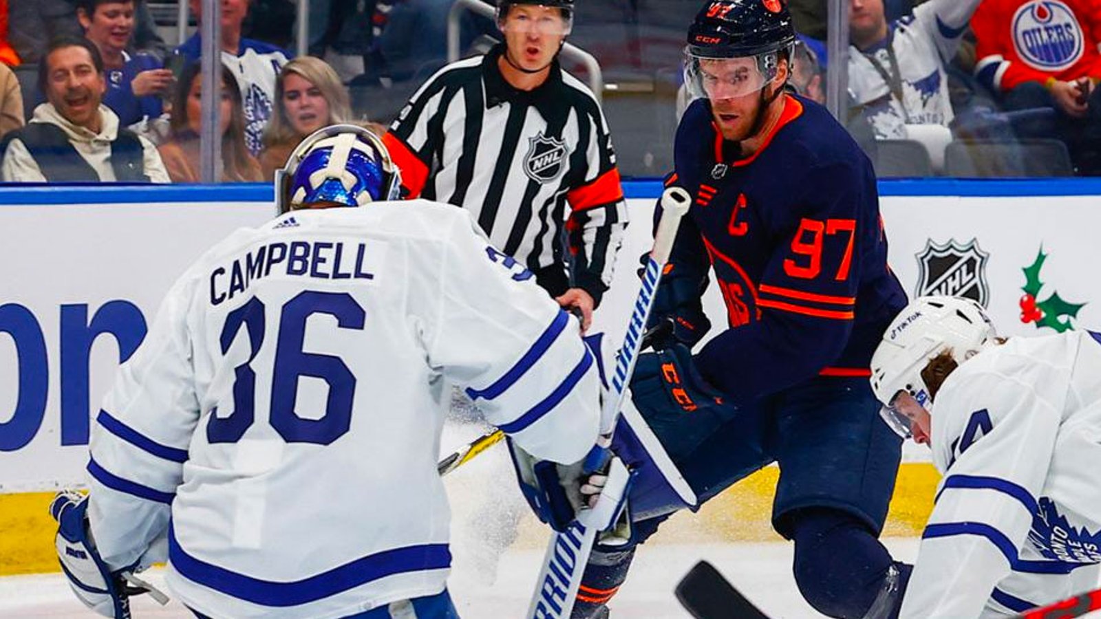 Connor McDavid pumps up his new goalie Jack Campbell