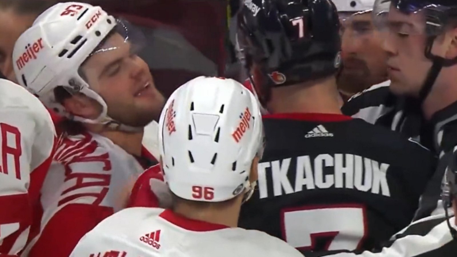 Tkachuk, Greig, give DeBrincat a rough welcome back to Ottawa.
