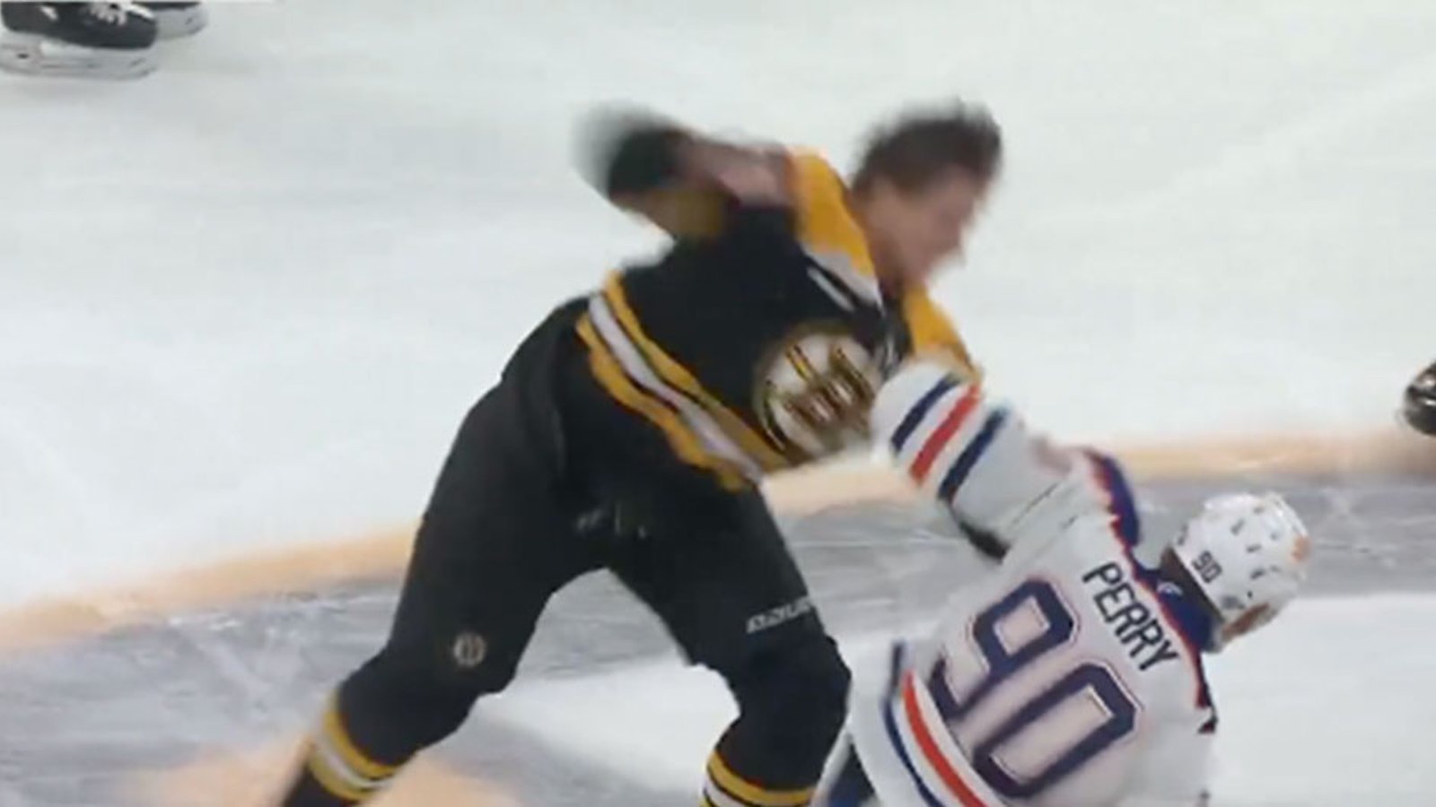 Trent Frederic uses Corey Perry as a punching bag in spirited bout at center ice!