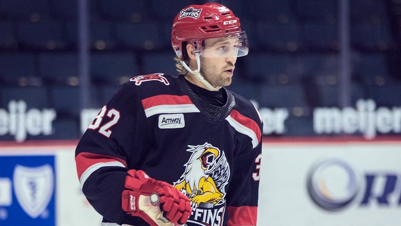 Red Wings prospect Tyler Spezia stretchered off the ice.