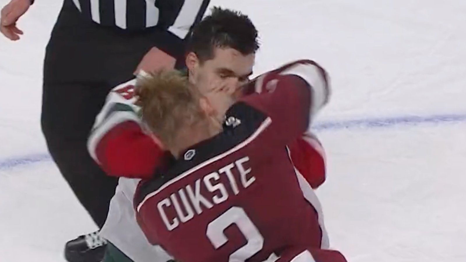 Double knockout at center ice!