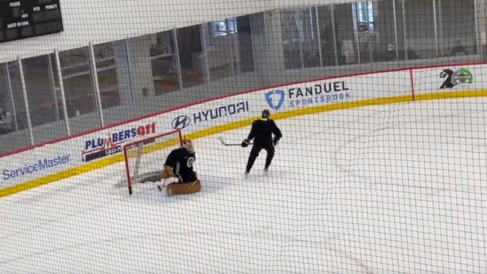 Marc-Andre Fleury throws stick at Patrick Kane in shootout drill 