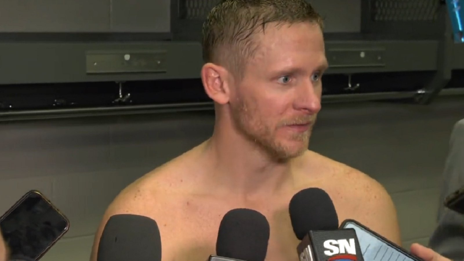 Corey Perry reacts to being cheered by fans in Montreal.
