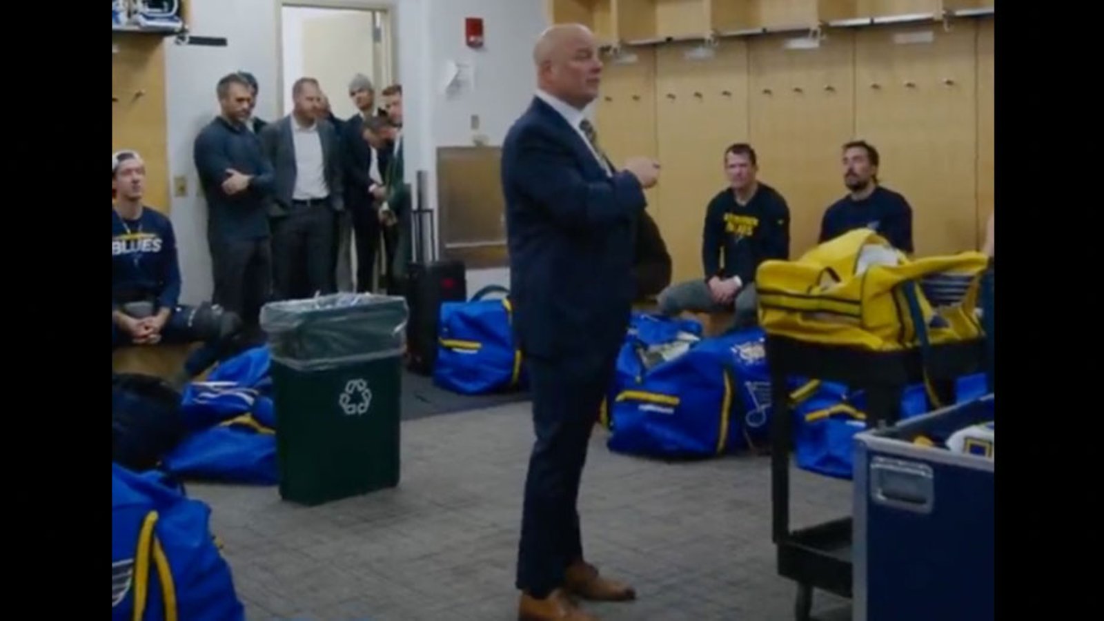 A special locker room celebrattion for Jim Montgomery's first win with the Blues
