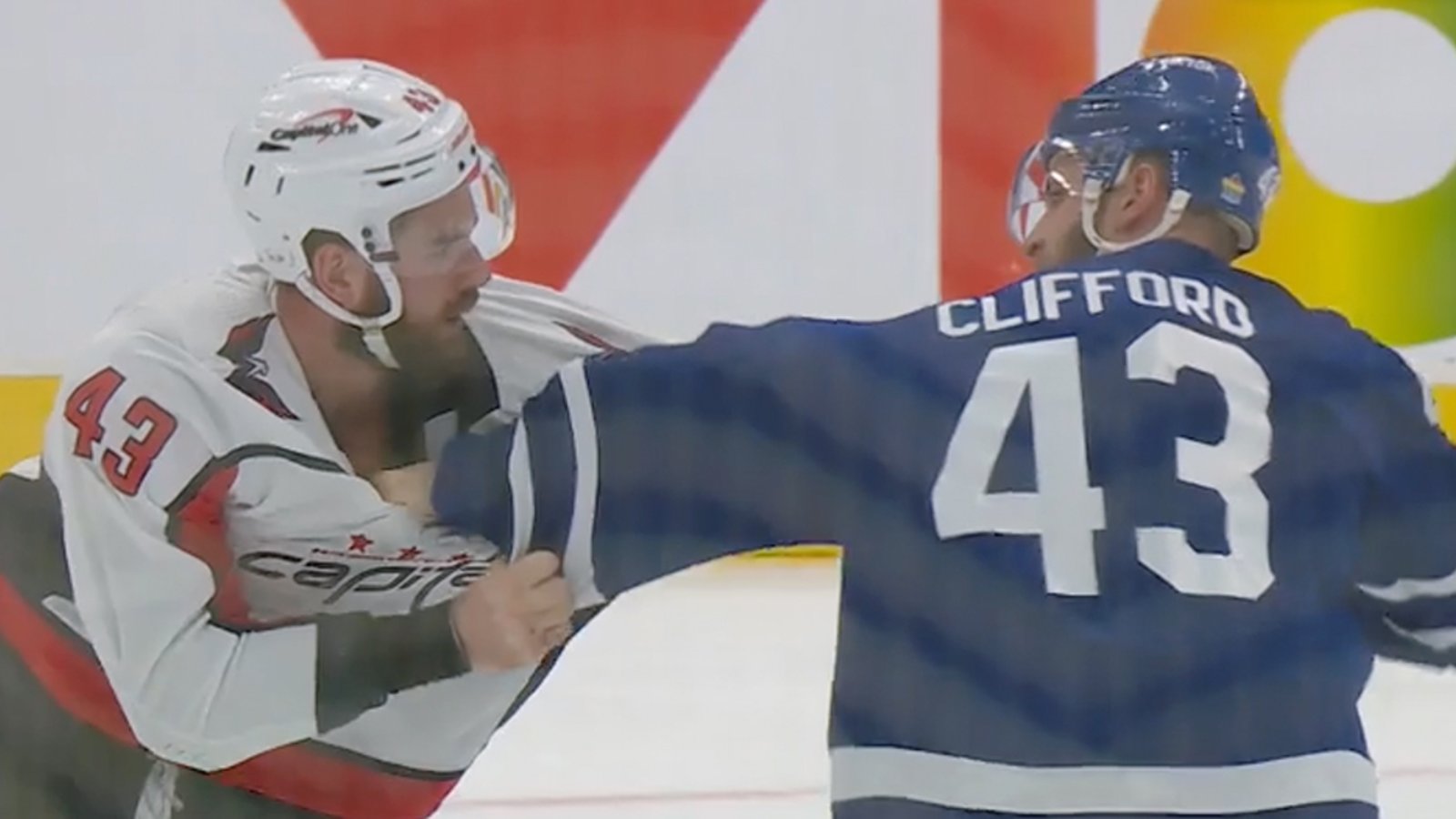 Clifford refuses to go down after eating shots from Wilson in very spirited bout