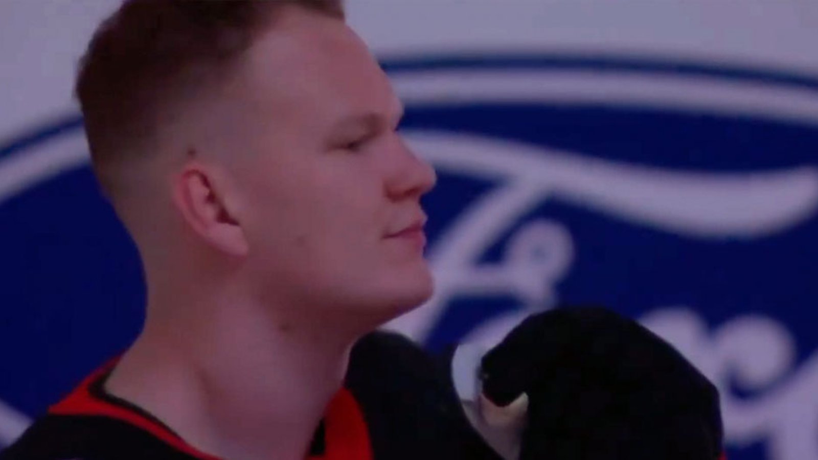 Captain Brady Tkachuk shakes his head in disgust as Senators fans boo 'The Star Spangled Banner'