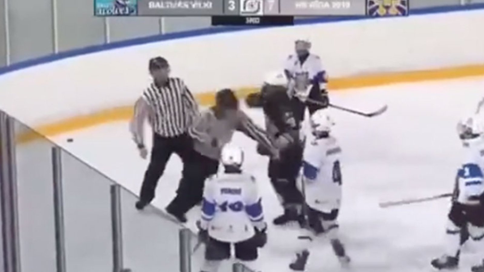 Youth player goes after both refs in crazy brawl