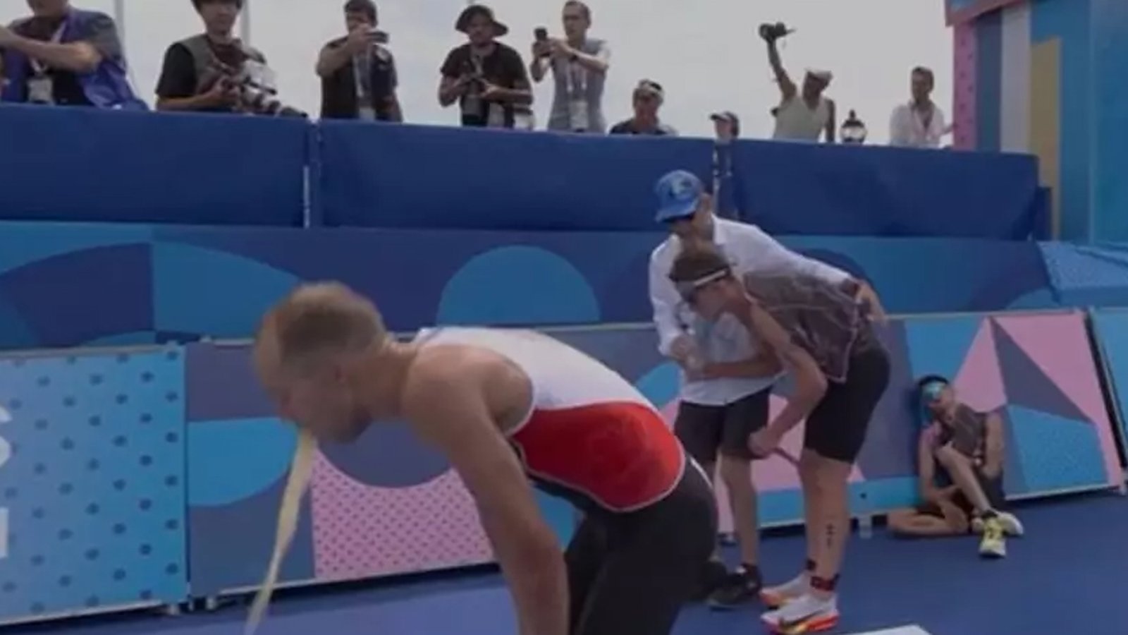 Canadian triathlete Tyler Mislawchuk throws up 10 times after racing in Seine River!