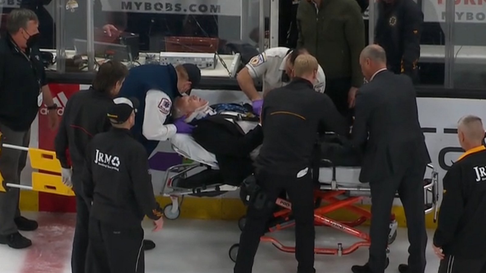 Bruins fans knock NHL official out cold.