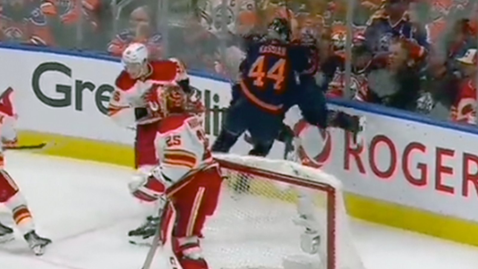 Oilers teammates Kassian and Archibald line each other up and absolutely smash each other behind Flames net
