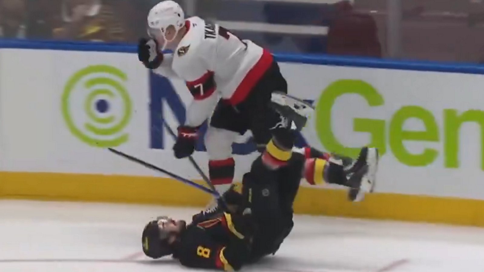 Brady Tkachuk manhandles Conor Garland like a child.