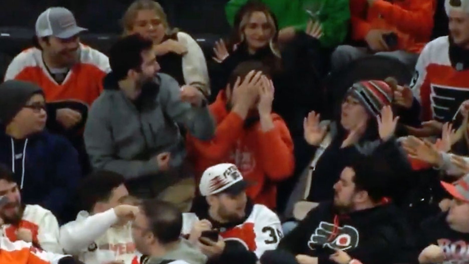 Flyers fan gets absolutely smoked in the face by errant puck