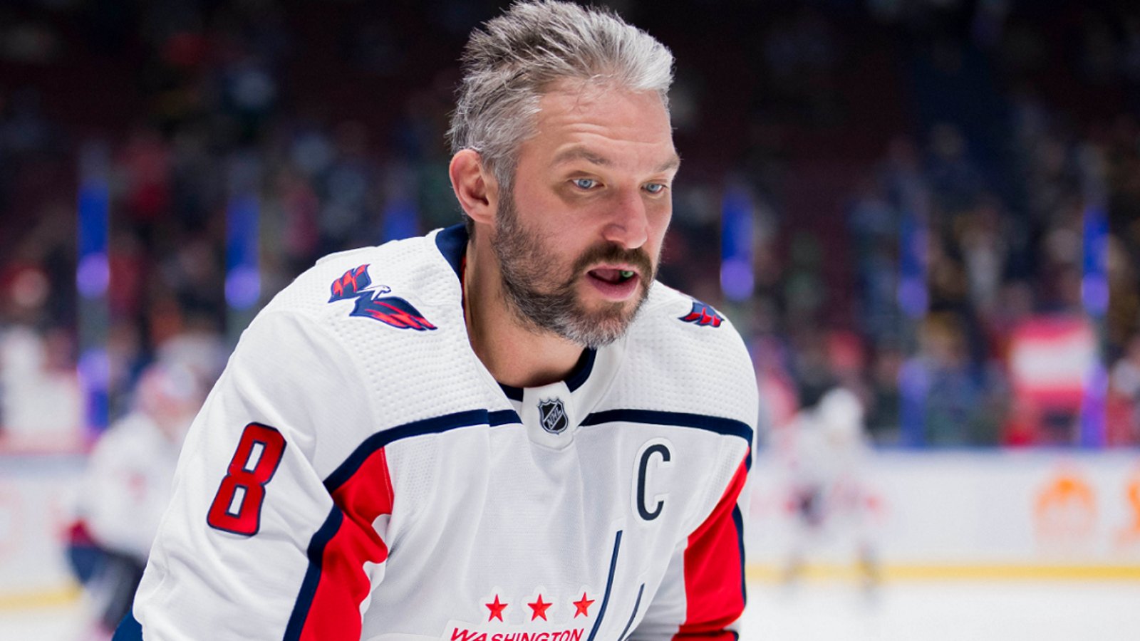 Alex Ovechkin leaves the ice after wincing in pain on Monday.